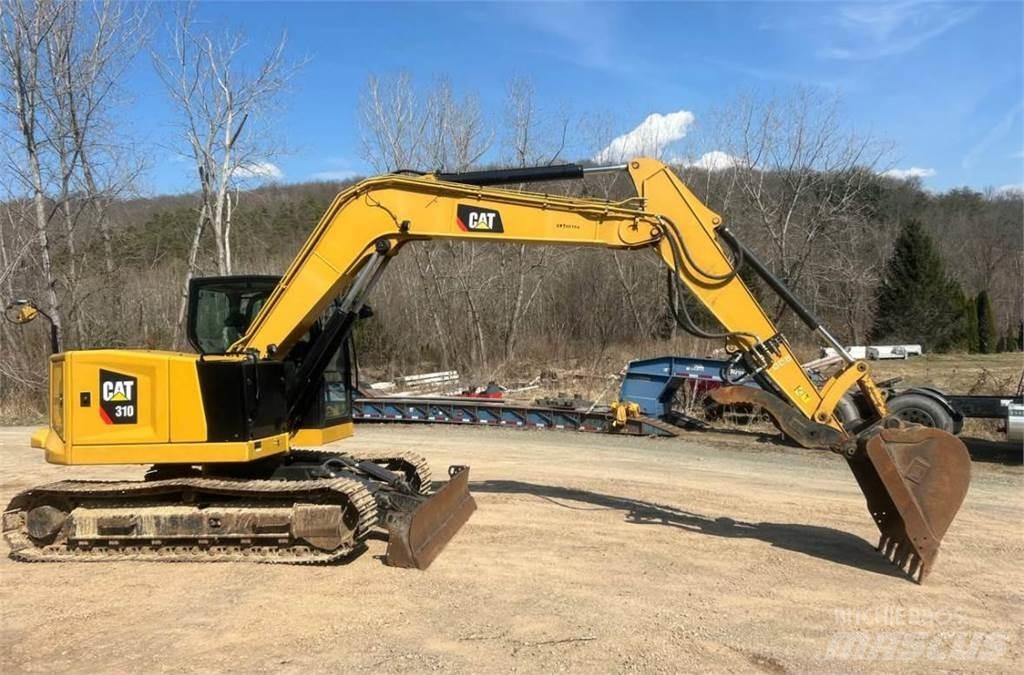 CAT 310 Minikoparki