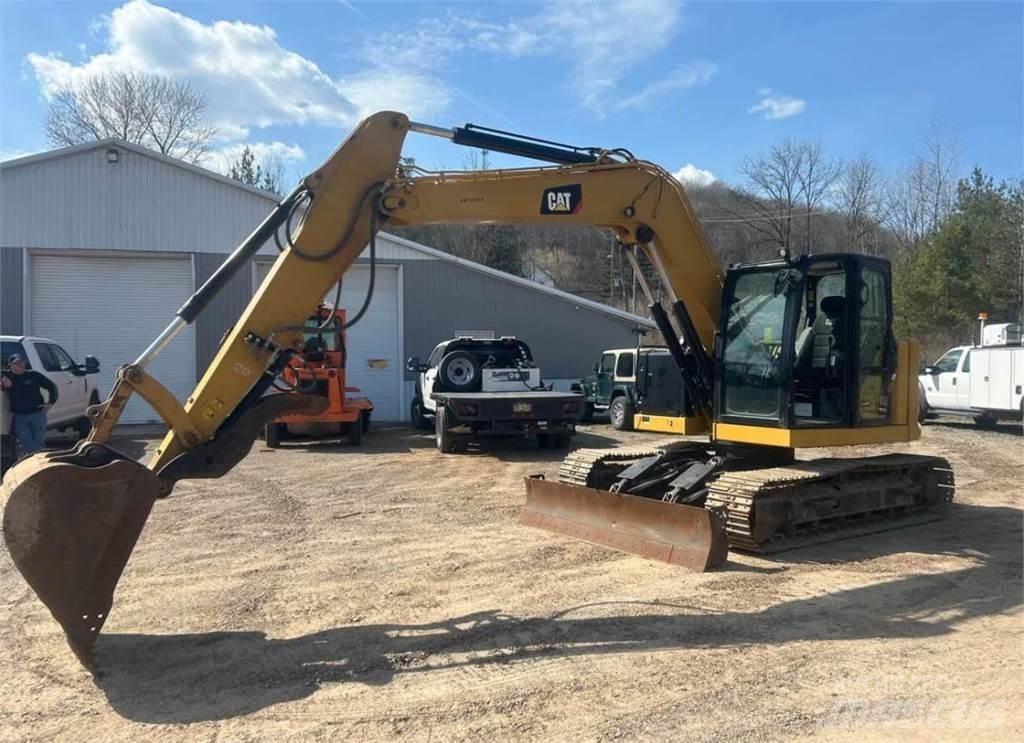 CAT 310 Minikoparki