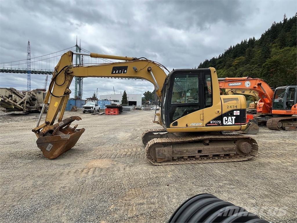 CAT 311C Koparki gąsienicowe