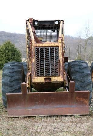 CAT 518 Skidery