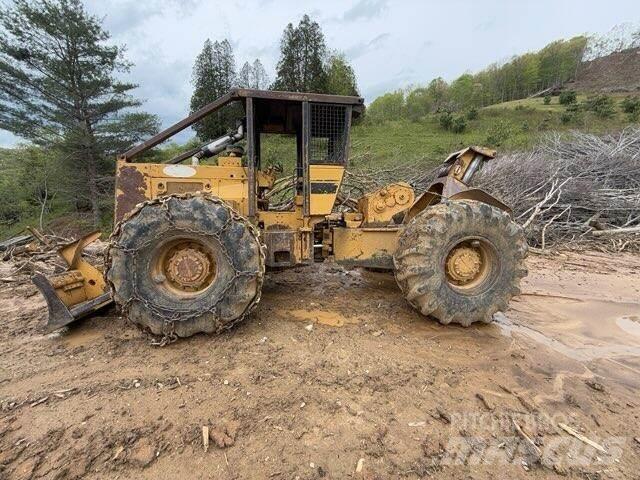 CAT 518 Skidery