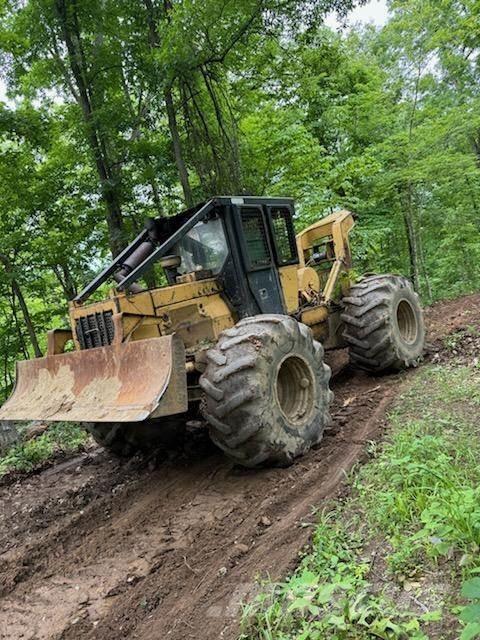 CAT 518C Skidery