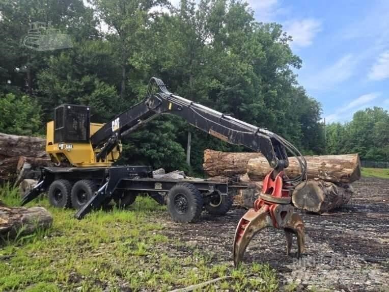 CAT 559C Ładowarki typu "knuckleboom"