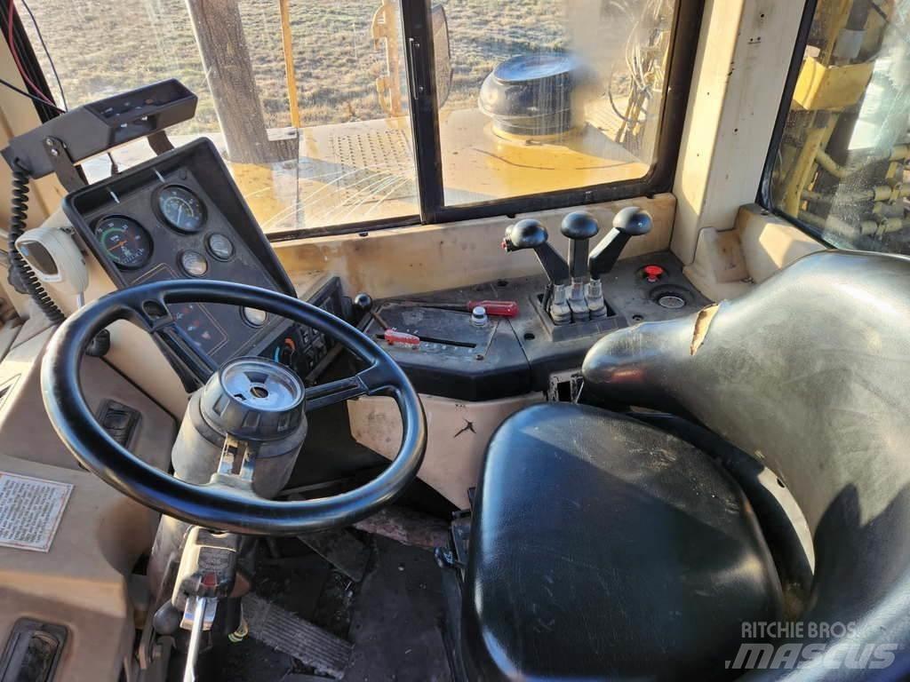 CAT 621F Skrobaki