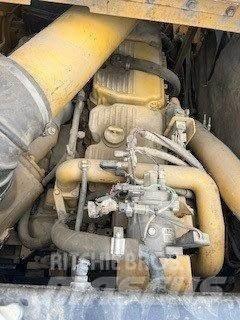 CAT 621G Skrobaki