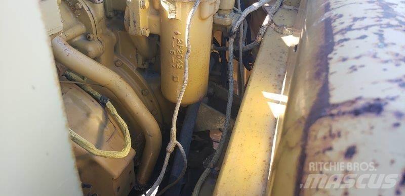 CAT 627B Skrobaki
