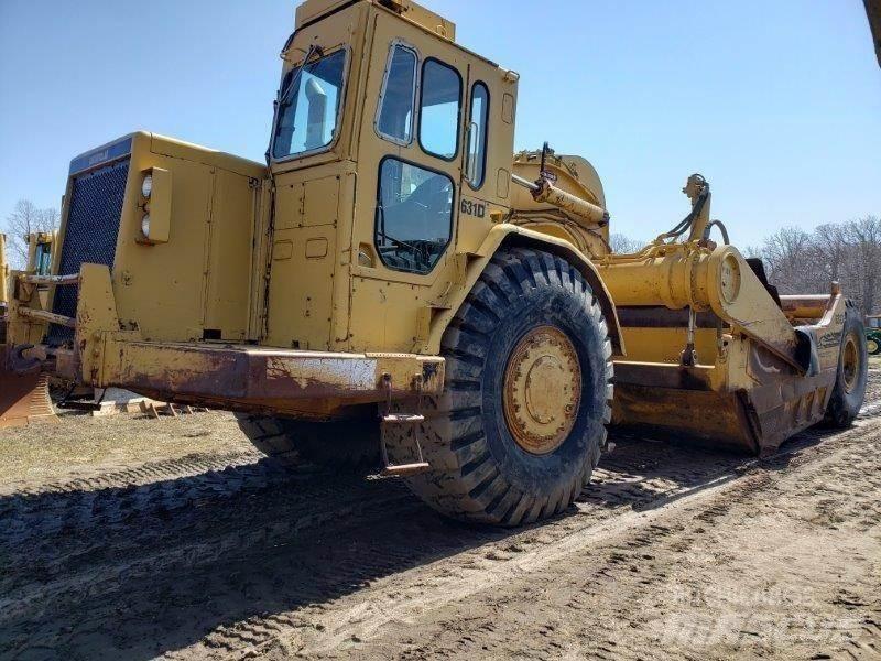 CAT 631D Skrobaki