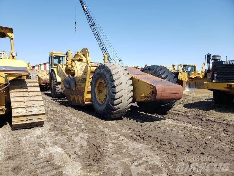 CAT 631D Skrobaki