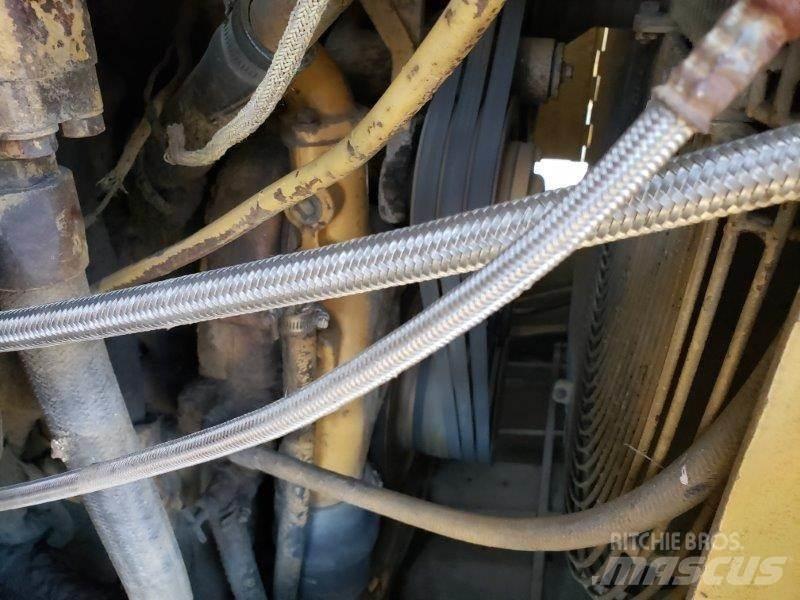 CAT 631D Skrobaki