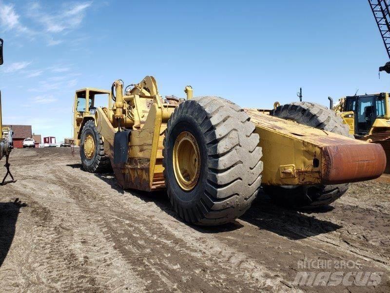 CAT 631D Skrobaki