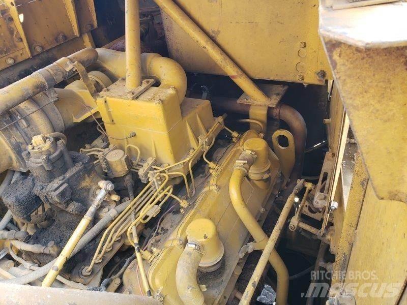 CAT 631D Skrobaki