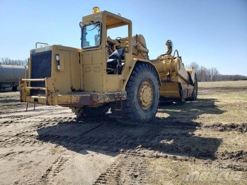 CAT 631D Skrobaki