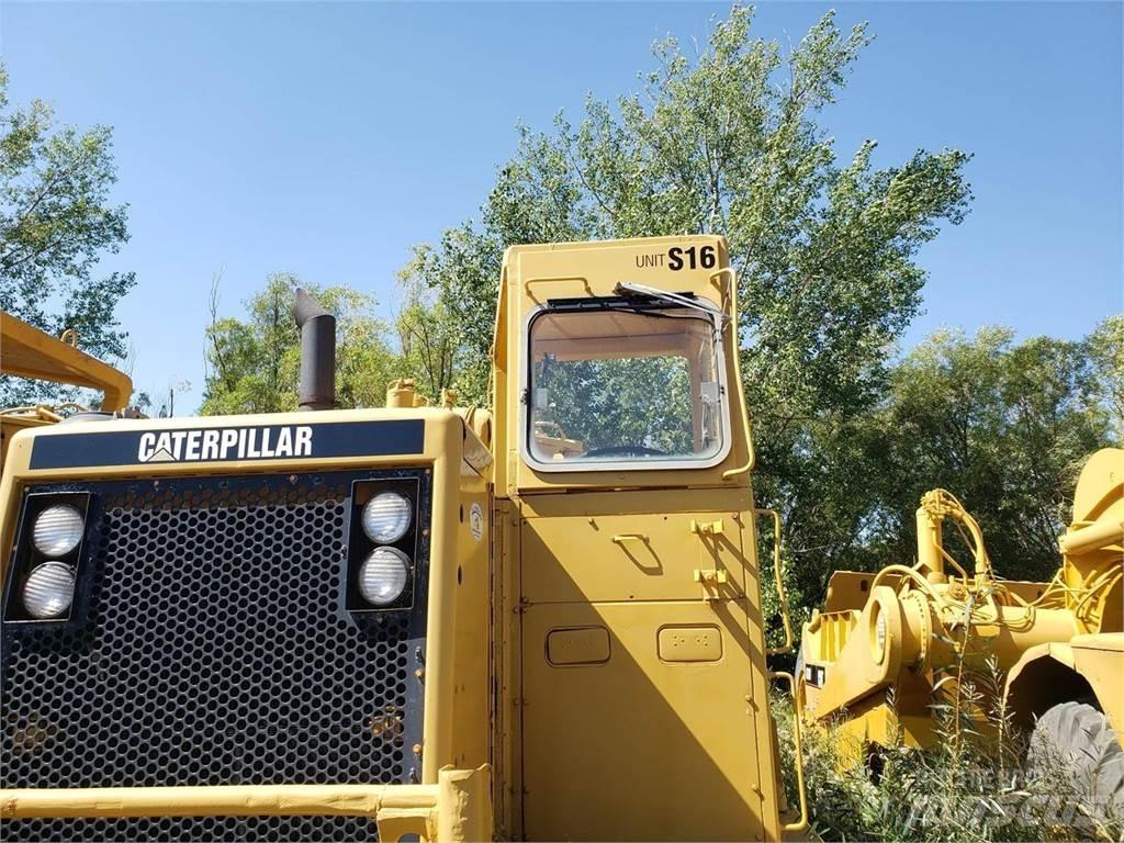 CAT 631D Skrobaki