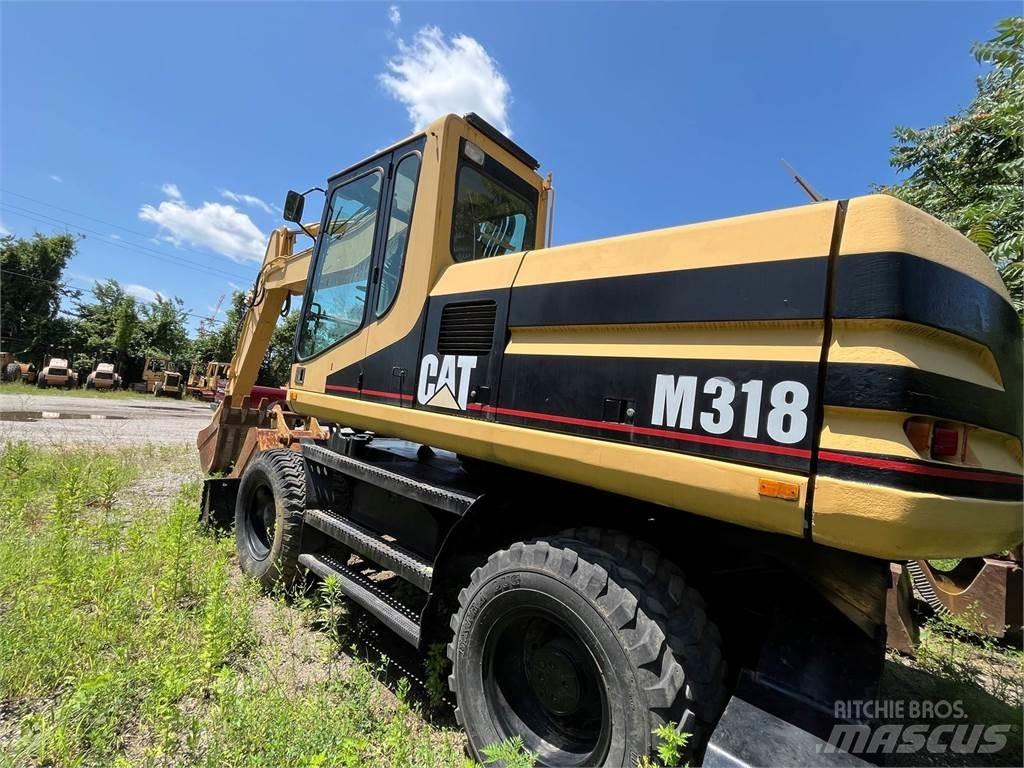 CAT M318 Koparki kołowe