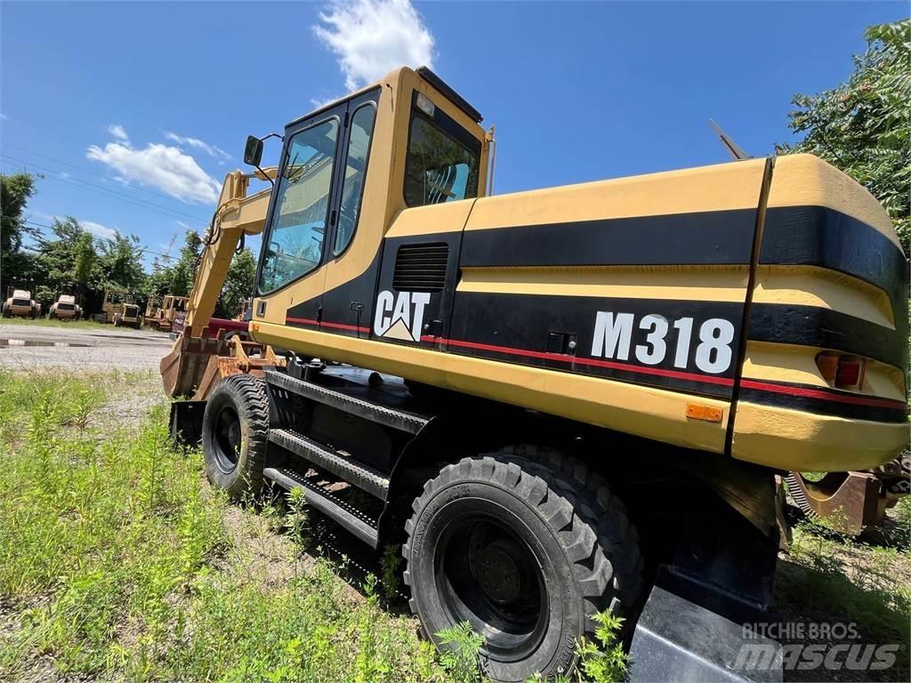 CAT M318 Koparki kołowe