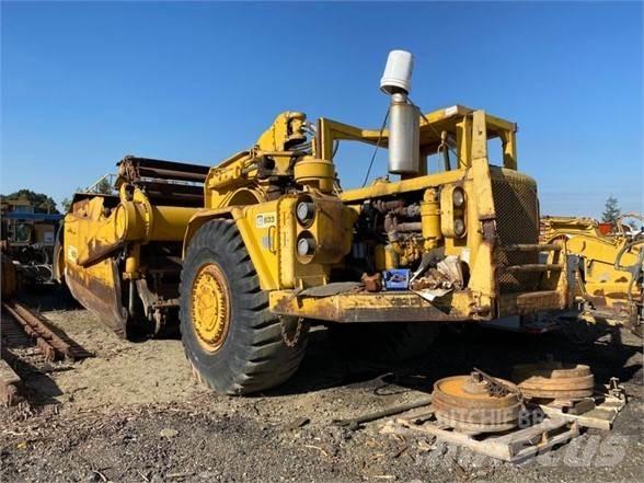 CAT 633 Skrobaki