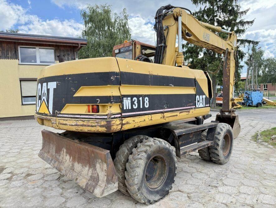 CAT M318 Koparki kołowe