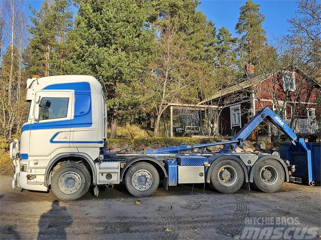 Scania R560 8x4 koukku Hakowce
