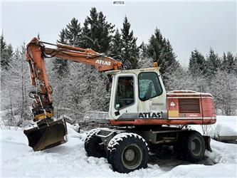 Atlas 1404 Wheel excavator w/ Rototilt and 2 buckets.