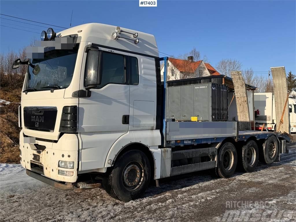 MAN TGX 35.480 8x4 flatbed truck w/ driving bridges Ciężarówki typu Platforma / Skrzynia