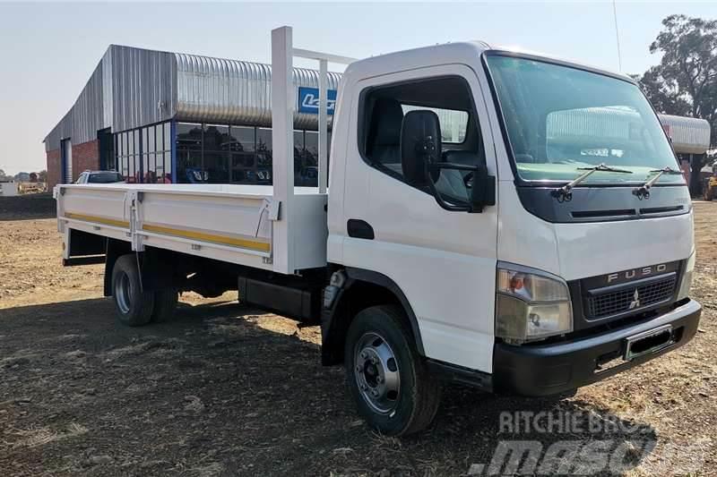 Mitsubishi Fuso Canter With Dropsides Inne