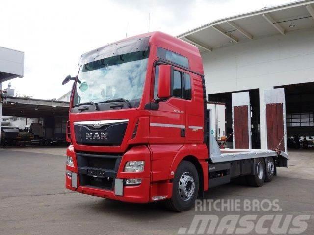 MAN TGX 26.400 6X2-2 LL Baggertransporter Ciężarówki typu Platforma / Skrzynia